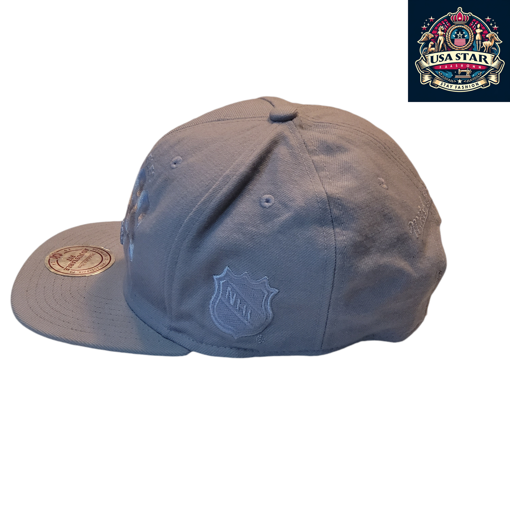 a blue hat with a crest on it