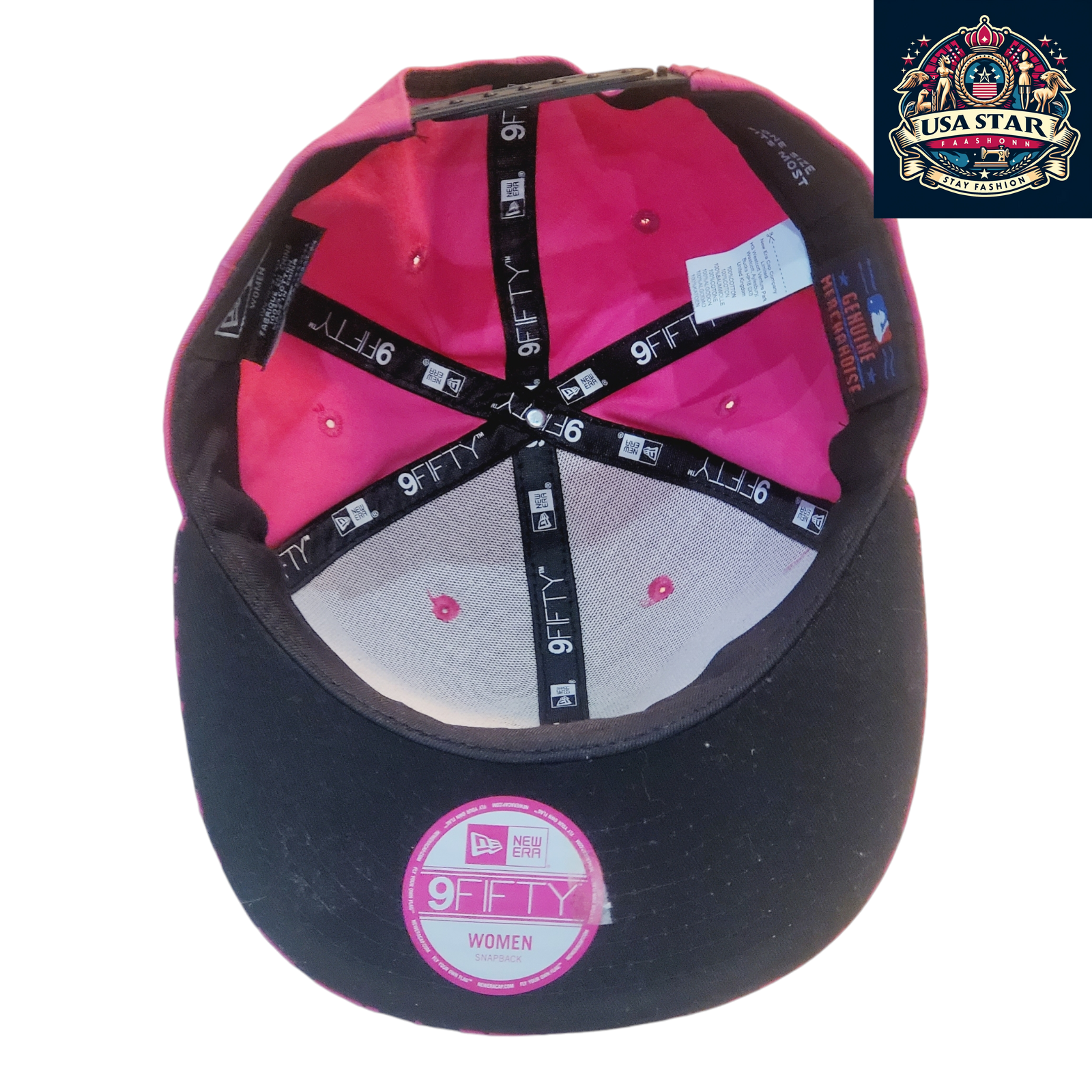 a pink and black hat with a tag on it