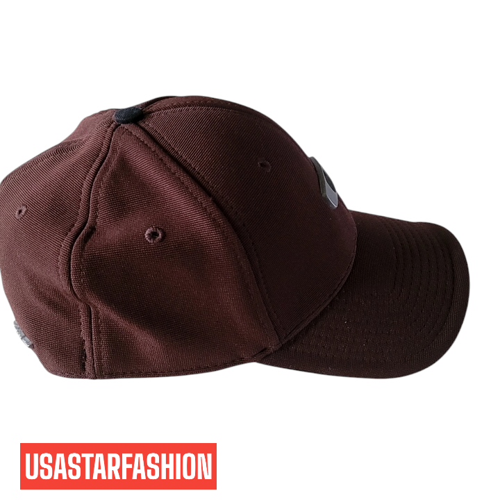 a maroon hat with a black patch on it