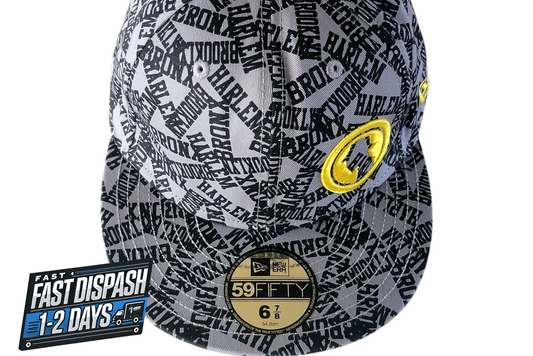 a hat with a yellow and black design on it