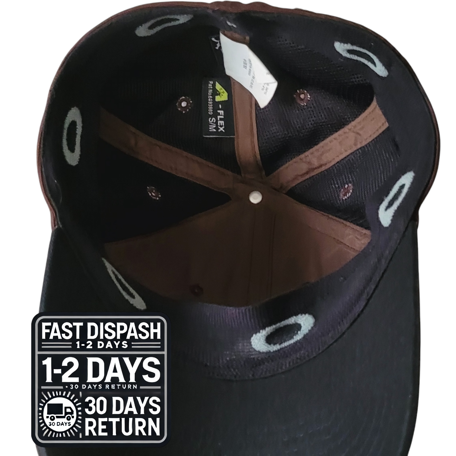 a black hat with a brown visor and a white tag on it