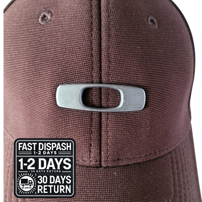 a brown hat with a metal buckle on it