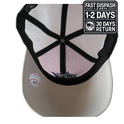 a white and black baseball hat with a fast dispatch sticker on it