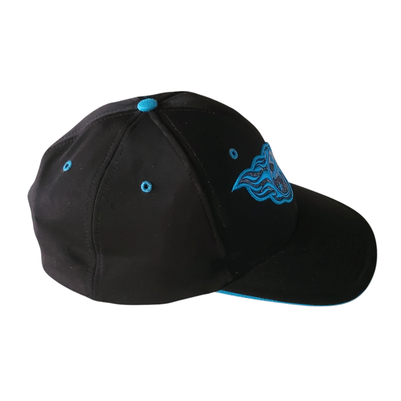 a black and blue hat with a fish on it