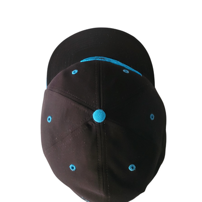 a black hat with blue dots on it