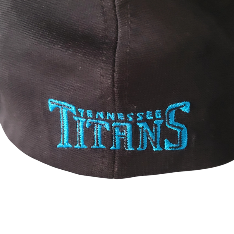 a tennessee titans hat with the tennessee titans embroidered on it