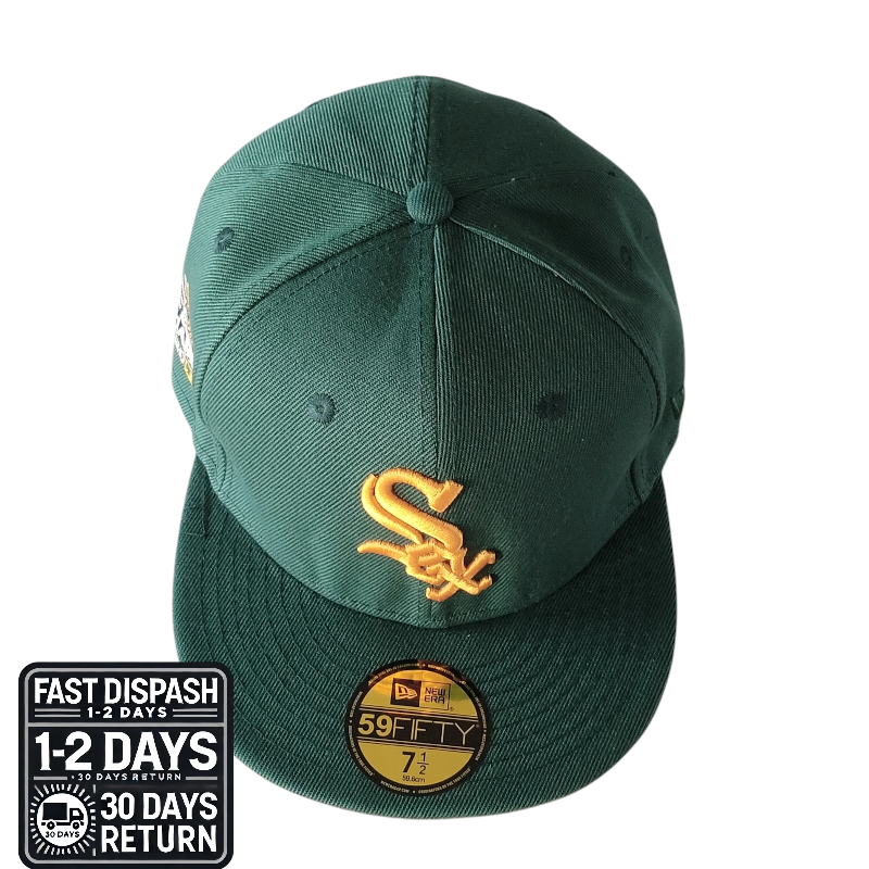 a green hat with a white sox logo on it