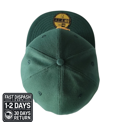 a green hat with a yellow badge on it