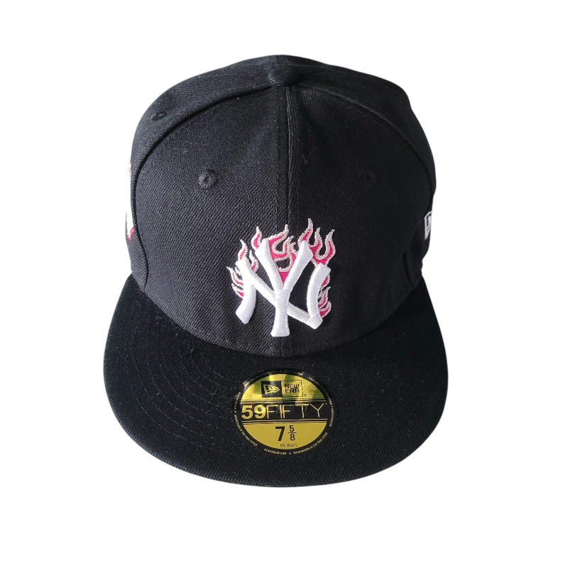 a new york yankees hat with flames on it