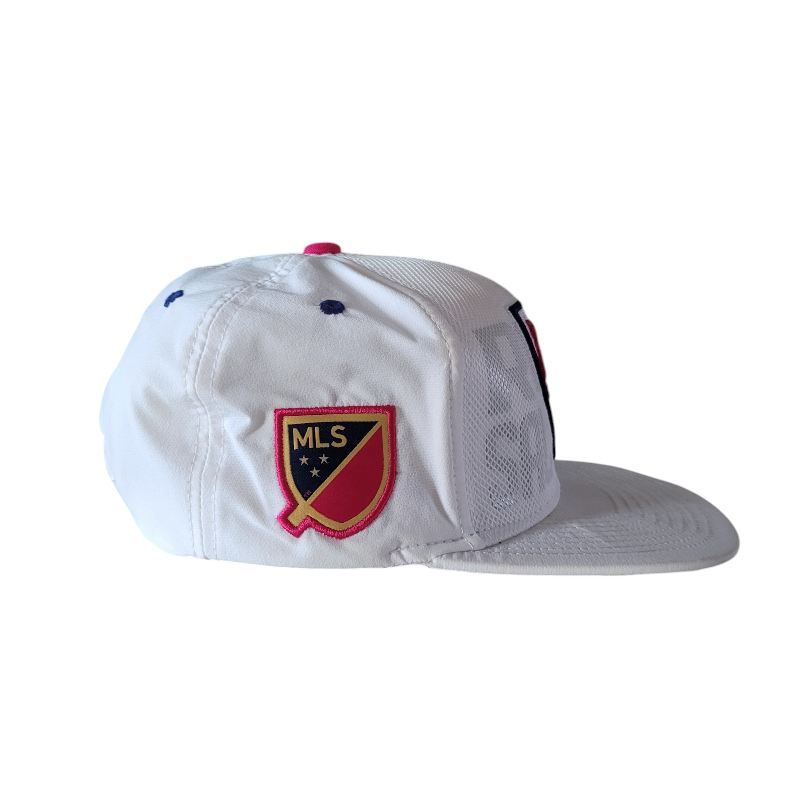 a white hat with a red and blue patch on it