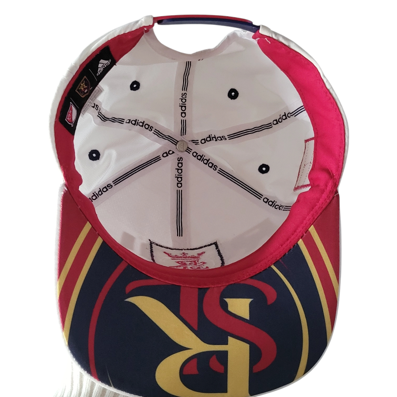 a baseball cap with a red, white and blue visor