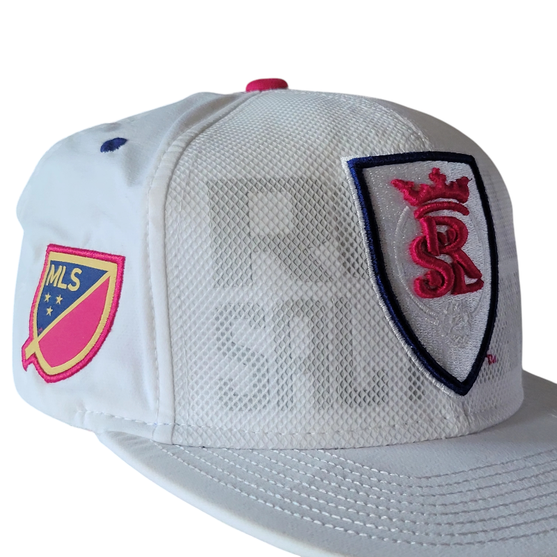 a white hat with a red and blue patch on it