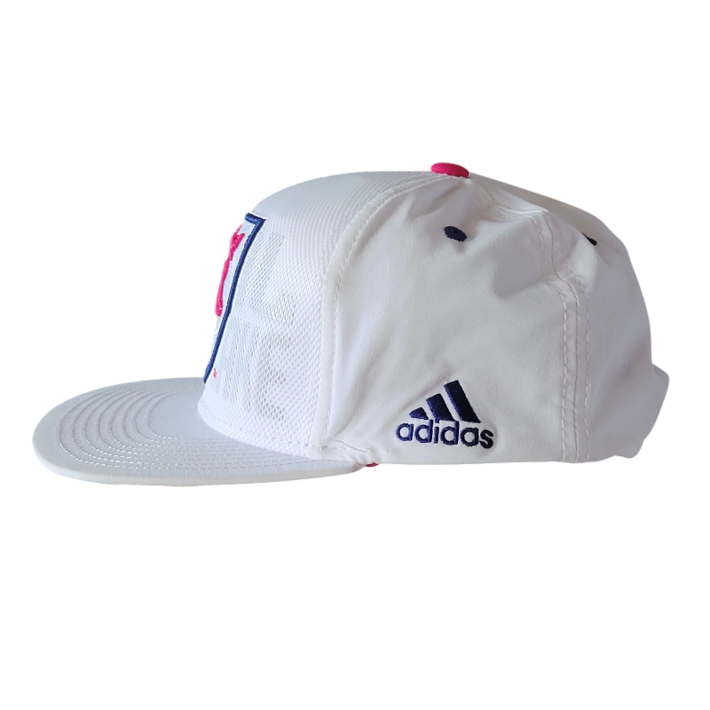 a white hat with a red, white and blue stripe