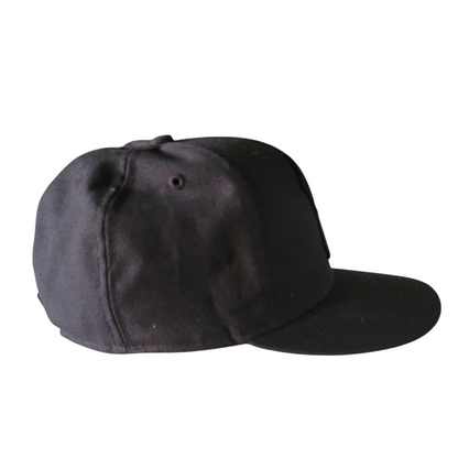 a black baseball cap on a white background