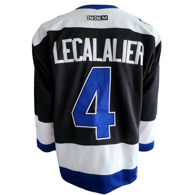 a hockey jersey with the number 4 on it