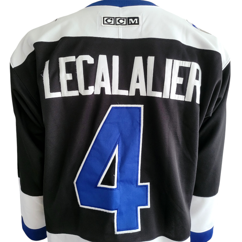 a hockey jersey with the number 4 on it