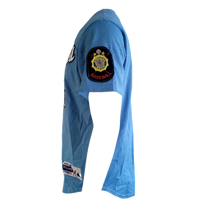 a blue hat with a badge on it