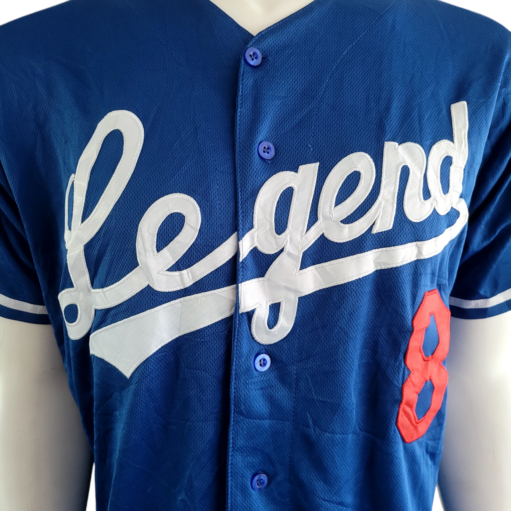 a baseball jersey with the word legend on it