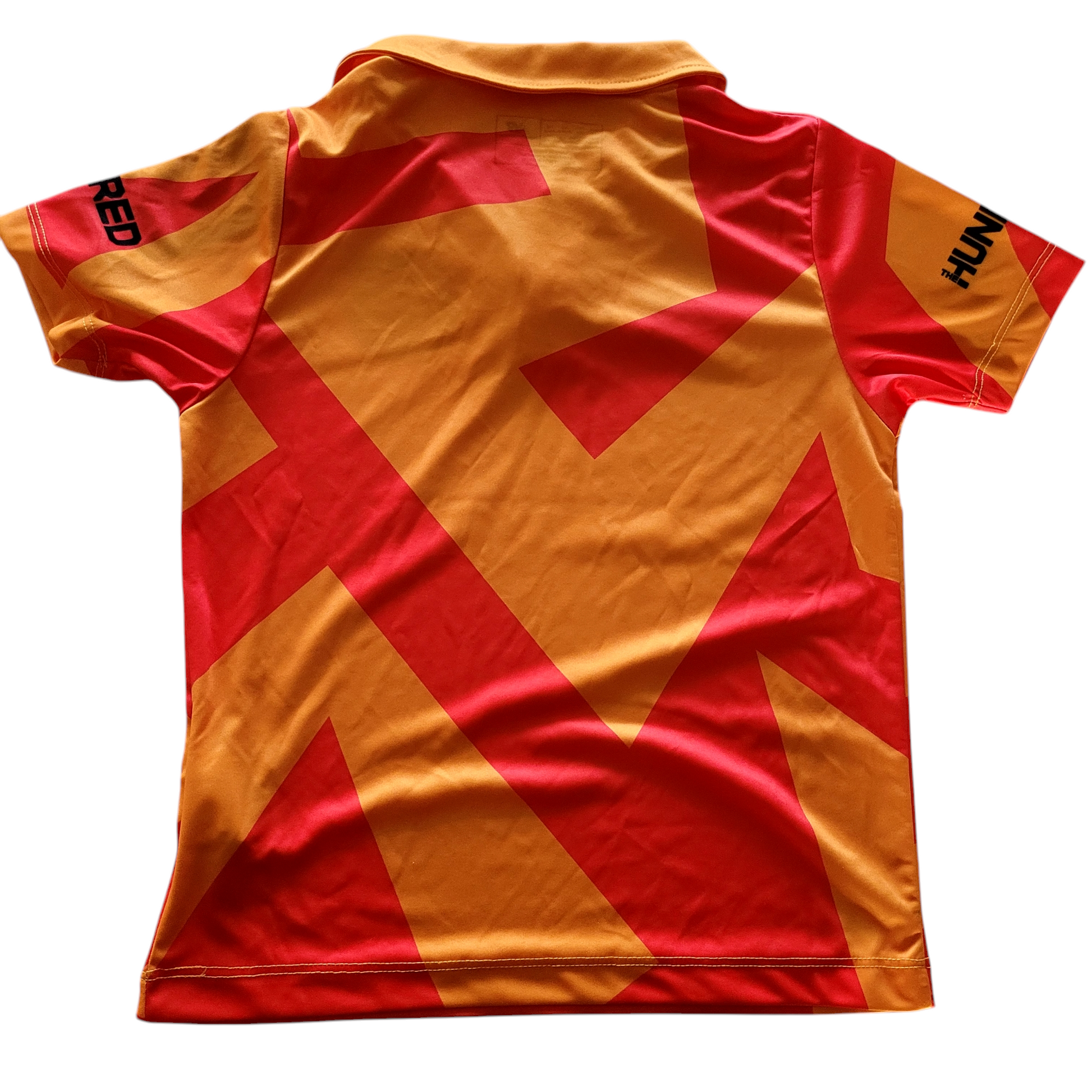 a yellow and red shirt with a red and yellow design on it